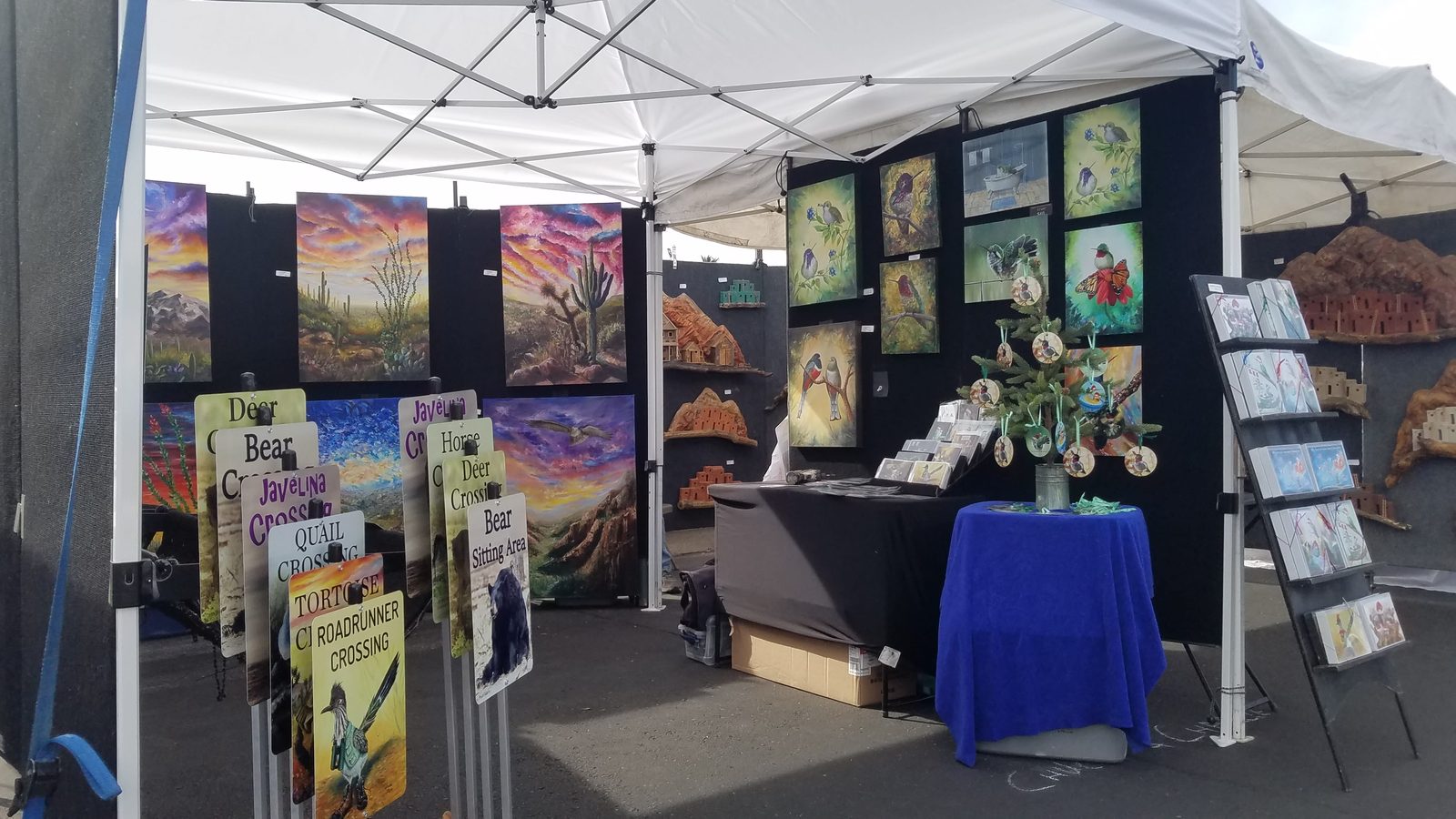 Inside a booth at a Kevin's Art Attack festival